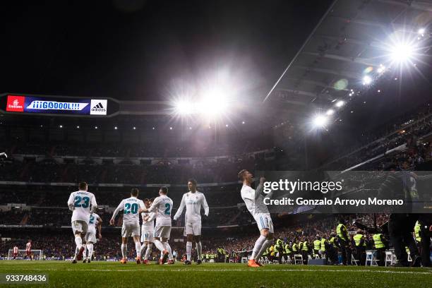 Cristiano Ronaldo of Real Madrid CF celebrates scoring their second goal during the La Liga match between Real Madrid CF and Girona FC at Estadio...