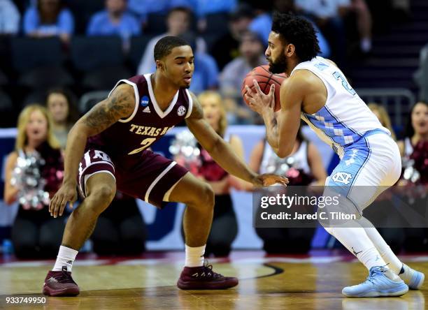 Starks of the Texas A&M Aggies defends Joel Berry II of the North Carolina Tar Heels during the second round of the 2018 NCAA Men's Basketball...