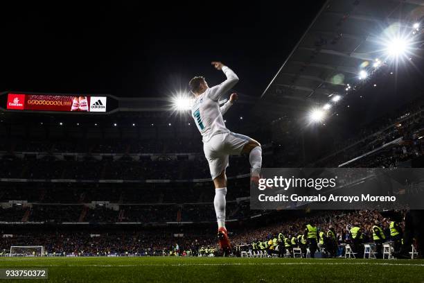 Cristiano Ronaldo of Real Madrid CF celebrates scoring their second goal during the La Liga match between Real Madrid CF and Girona FC at Estadio...