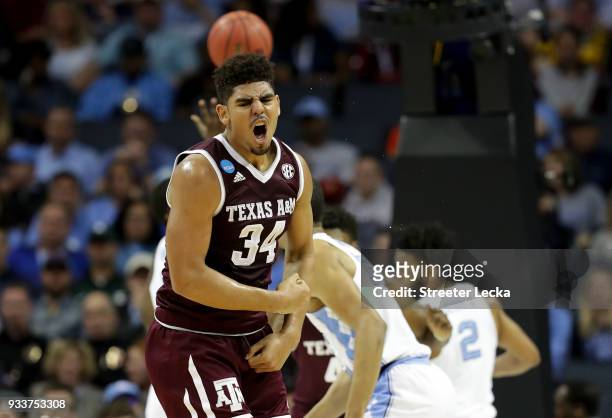 Tyler Davis of the Texas A&M Aggies reacts after scoring against the North Carolina Tar Heels during the second round of the 2018 NCAA Men's...