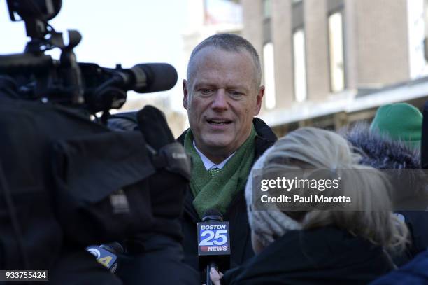 Massachusetts Governor Charlie Baker takes part in the 117th Annual St Patrick's Day Parade on March 18, 2018 in Boston, Massachusetts.