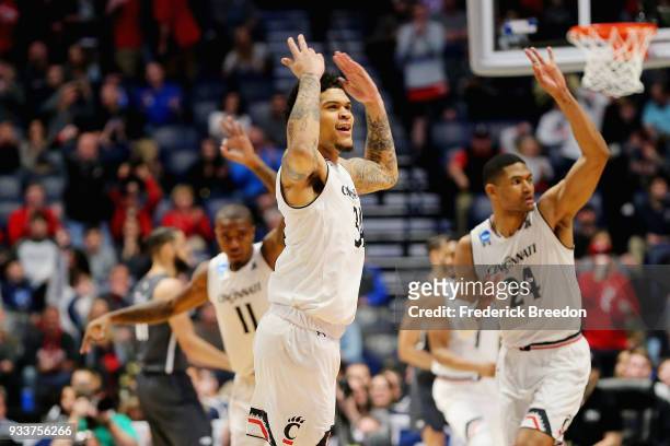 Jarron Cumberland of the Cincinnati Bearcats celebrates after a basket against the Nevada Wolf Pack during the first half in the second round of the...