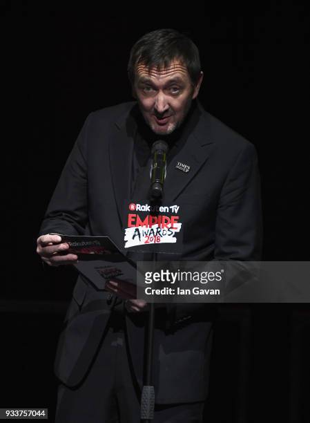 Actor Ralph Ineson presents the award for Best Horror on stage during the Rakuten TV EMPIRE Awards 2018 at The Roundhouse on March 18, 2018 in...