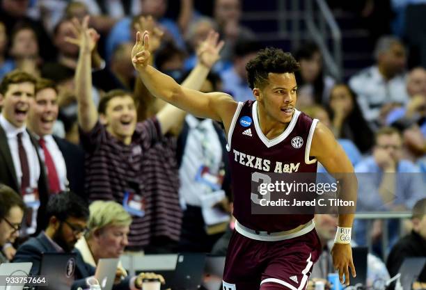 Admon Gilder of the Texas A&M Aggies reacts after a three point shot against the North Carolina Tar Heels during the second round of the 2018 NCAA...