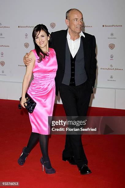 Actor Heiner Lauterbach and wife Viktoria attend the premiere of 'Zweiohrkueken' at the Sony Center CineStar on November 24, 2009 in Berlin, Germany.