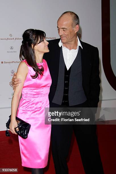Actor Heiner Lauterbach and wife Viktoria attend the premiere of 'Zweiohrkueken' at the Sony Center CineStar on November 24, 2009 in Berlin, Germany.