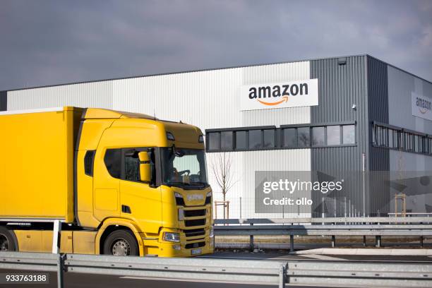 logistics center of amazon in raunheim-moenchhof, germany - amazon brand name stock pictures, royalty-free photos & images