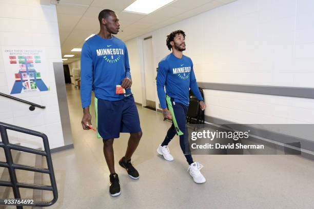 Gorgui Dieng and Derrick Rose of the Minnesota Timberwolves arrive before the game against the Houston Rockets on March 18, 2018 at Target Center in...