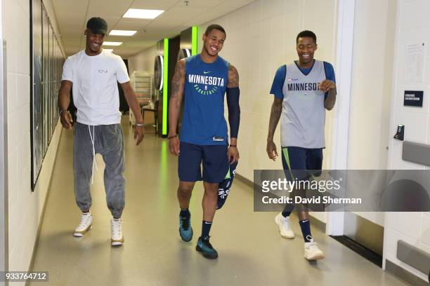 Jimmy Butler, Marcus Georges-Hunt and Jamal Crawford of the Minnesota Timberwolves make their arrival together before the game against the Houston...
