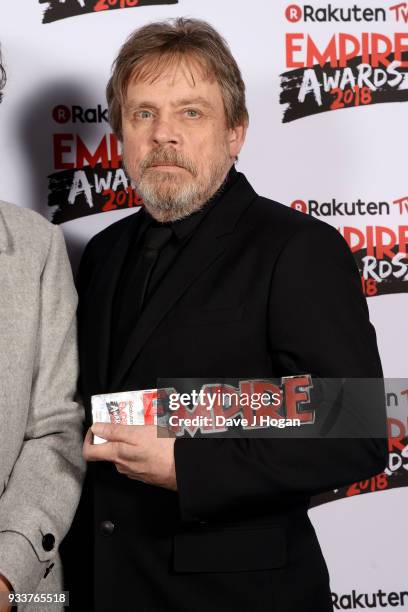 Mark Hamill, winner of the Best Film award for 'Star Wars: The Last Jedi', poses in the winners room at the Rakuten TV EMPIRE Awards 2018 at The...