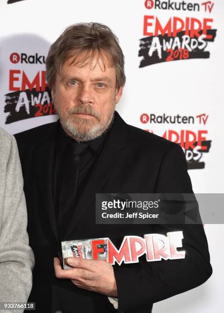 Mark Hamill, winner of the Empire Icon award, poses in the winners room at the Rakuten TV EMPIRE Awards 2018 at The Roundhouse on March 18, 2018 in...