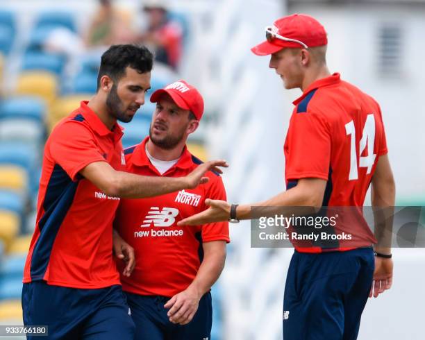 Saqib Mahmood , Steven Mullaney and Zak Chappell of North celebrates the dismissal of Sam Curran of South during the ECB North v South Series match...