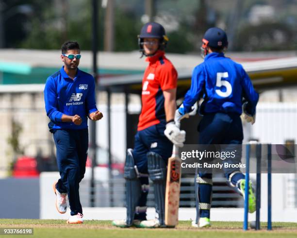 Ravi Patel of South celebrates the dismissal of Alex Davies of North during the ECB North v South Series match One at Kensington Oval on March 18,...