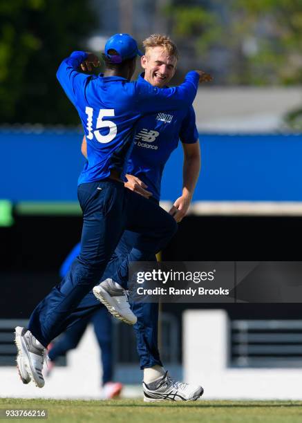 Paul Walter and Delray Rawlins of South celebrates the dismissal of Adam Hose of North during the ECB North v South Series match One at Kensington...