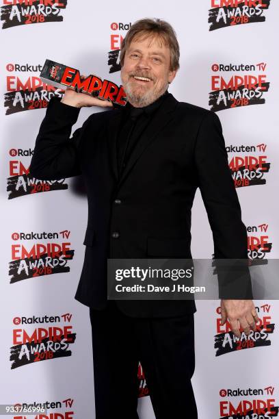 Mark Hamill, winner of the Best Film award for 'Star Wars: The Last Jedi', poses in the winners room at the Rakuten TV EMPIRE Awards 2018 at The...