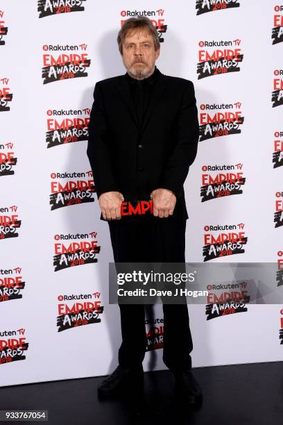 Mark Hamill, winner of the Best Film award for 'Star Wars: The Last Jedi', poses in the winners room at the Rakuten TV EMPIRE Awards 2018 at The...