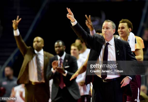 Head coach Billy Kennedy of the Texas A&M Aggies makes a call against the North Carolina Tar Heels during the second round of the 2018 NCAA Men's...