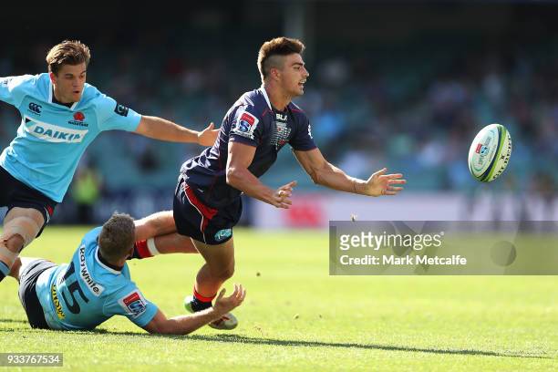 Jack Maddocks of the Rebels passes during the round five Super Rugby match between the Waratahs and the Rebels at Allianz Stadium on March 18, 2018...