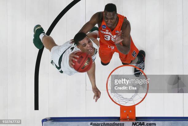Miles Bridges of the Michigan State Spartans dunks the ball against the Syracuse Orange in the second round of the 2018 NCAA Men's Basketball...