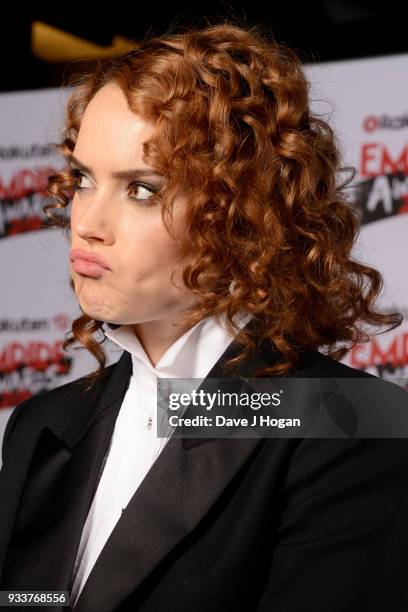 Daisy Ridley, winner of the Best Film award for 'Star Wars: The Last Jedi', poses in the winners room at the Rakuten TV EMPIRE Awards 2018 at The...