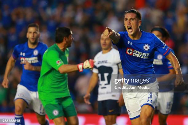 Enzo Roco of Cruz Azul celebrates after scoring the first goal of his team during the 12th round match between Cruz Azul and Pumas UNAM as part of...