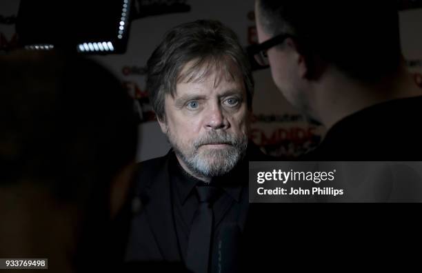 Mark Hamill, winner of the Empire Icon award, is interviewed in the winners room at the Rakuten TV EMPIRE Awards 2018 at The Roundhouse on March 18,...