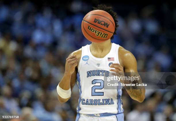 Joel Berry II of the North Carolina Tar Heels takes a foul shot against the Texas A&M Aggies during the second round of the 2018 NCAA Men's...