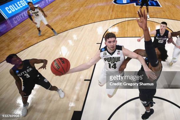 Ryan Cline of the Purdue Boilermakers drives to the basket against the Butler Bulldogs in the second round of the 2018 NCAA Men's Basketball...