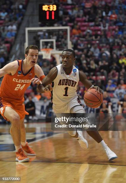 Jared Harper of the Auburn Tigers drives against David Skara of the Clemson Tigers in the first half during the second round of the 2018 NCAA Men's...