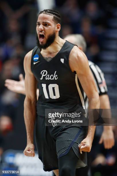 Caleb Martin of the Nevada Wolf Pack celebrates against the Cincinnati Bearcats during the second half in the second round of the 2018 Men's NCAA...