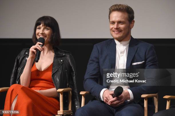 Caitriona Balfe and Sam Heughan speak on stage at the STARZ Outlander FYC Event at Linwood Dunn Theater on March 18, 2018 in Los Angeles, California.