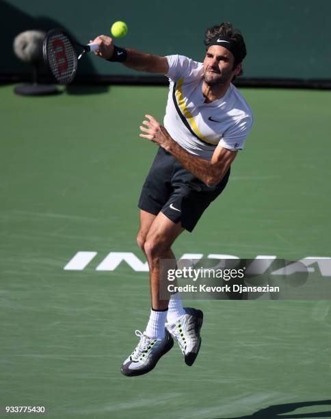 Roger Federer of Switzerland serves against Juan Martin Del Potro of Argentina during the men's final match on Day 14 of BNP Paribas Open on March...