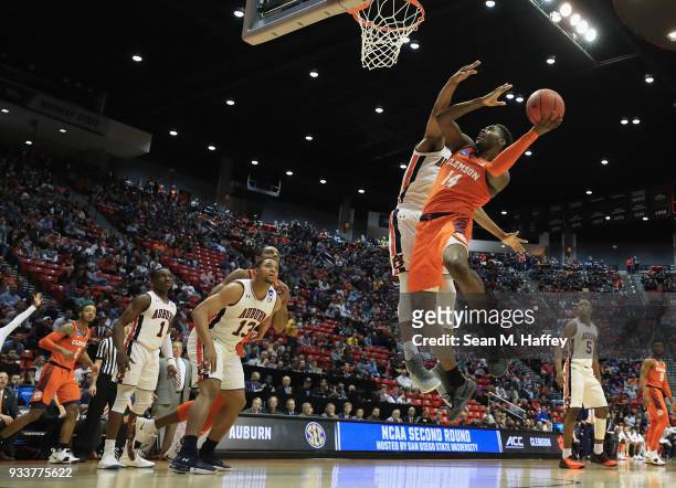 Elijah Thomas of the Clemson Tigers goes up for a shot against the Auburn Tigers in the first half during the second round of the 2018 NCAA Men's...
