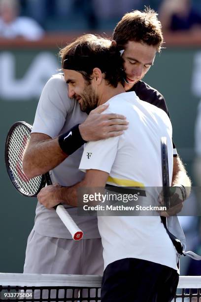 Juan Martin Del Potro of Argentina is congratulated by Roger Federer of Switzerland after their match during the men's final on Day 14 of the BNP...