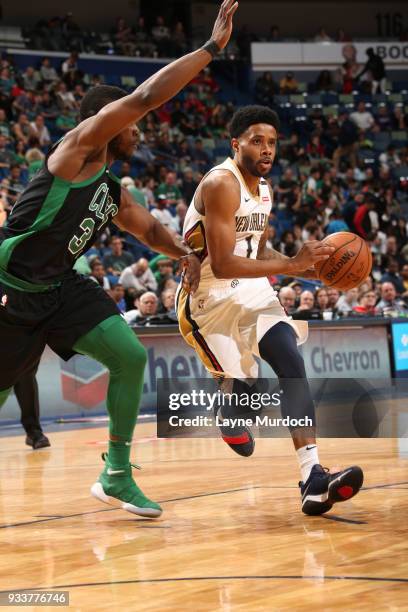 Larry Drew II of the New Orleans Pelicans handles the ball against the Boston Celtics on March 18, 2018 at Smoothie King Center in New Orleans,...