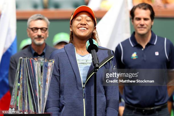 Naomi Osaka of Japan addreses the audiance at the trophy ceremony after defeating Daria Kasatkina of Russia during the women's final on Day 14 of the...