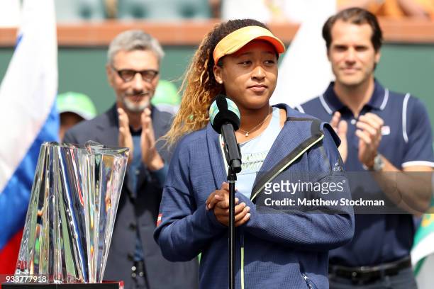 Naomi Osaka of Japan addreses the audiance at the trophy ceremony after defeating Daria Kasatkina of Russia during the women's final on Day 14 of the...