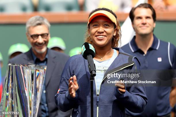 Naomi Osaka of Japan addreses the audiance at the trophy ceremony after defeating Daria Kasatkina of Russia during the women's final on Day 14 of the...