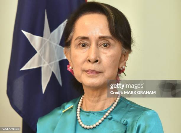 Myanmar's State Counsellor Aung San Suu Kyi waits before a meeting with Australian officials during her visit to Parliament House in Canberra on...