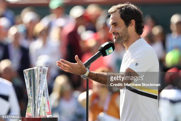 Roger Federer of Switzerland addreses the audiance at the trophy ceremony after losing to Juan Martin Del Potro of Argentina during the men's final...
