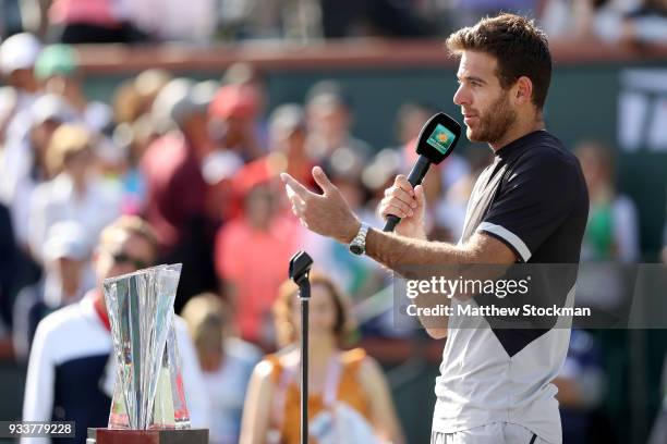 Juan Martin Del Potro of Argentina addreses the audiance at the trophy ceremony after defeating Roger Federer of Switzerland during the men's final...