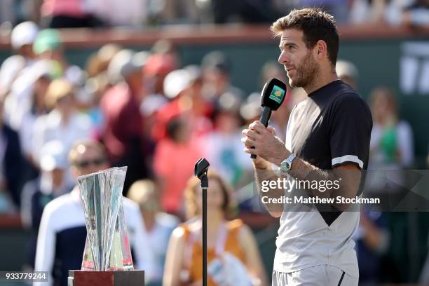 Juan Martin Del Potro of Argentina addreses the audiance at the trophy ceremony after defeating Roger Federer of Switzerland during the men's final...