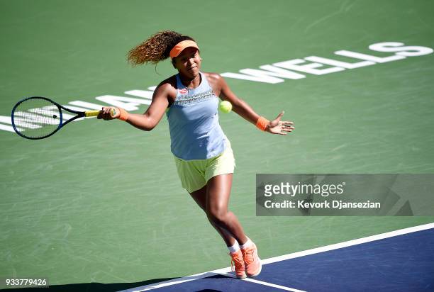 Naomi Osaka of Japan returns against Daria Kasatkina of Russia during the women's final on Day 14 of BNP Paribas Open on March 18, 2018 in Indian...