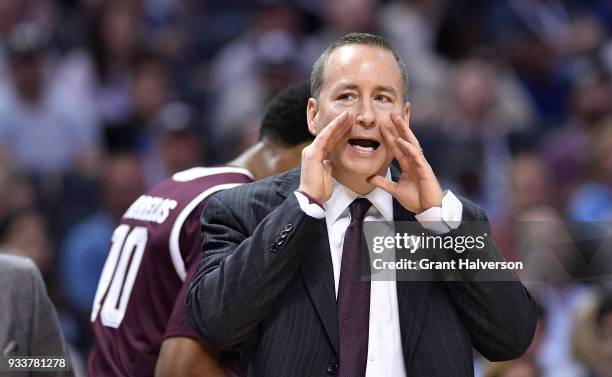 Head coach Billy Kennedy of the Texas A&M Aggies talks to his team during the game against the North Carolina Tar Heels in the second round of the...