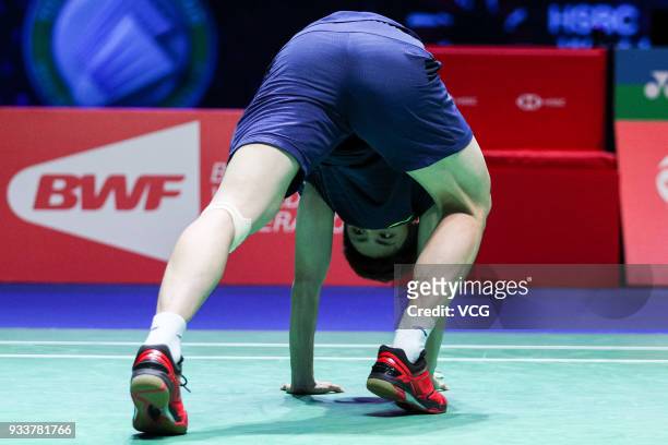 Shi Yuqi of China reacts during the Men's singles final match against Lin Dan of China on day five of the YONEX All England Open 2018 Badminton...