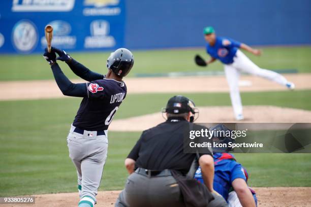 Melvin Upton Jr. Of the Indians swings at a pitch from Jose Quintana of the Cubs during a game between the Chicago Cubs and Cleveland Indians as part...