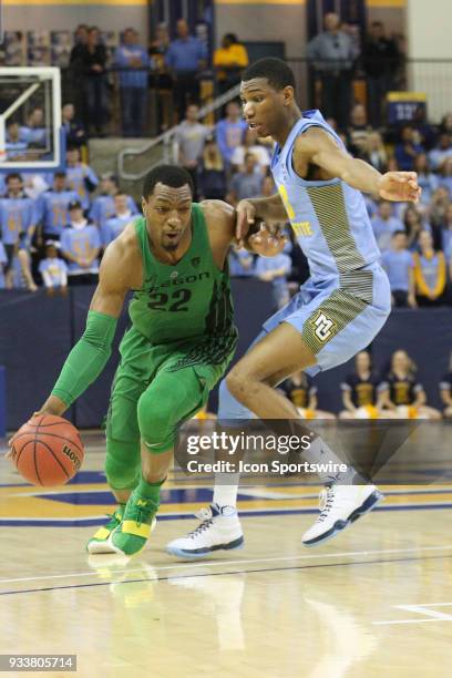 Oregon Ducks forward MiKyle McIntosh drives the lane during a National Invitation Tournament game between the Marquette Golden Eagles and the Oregon...