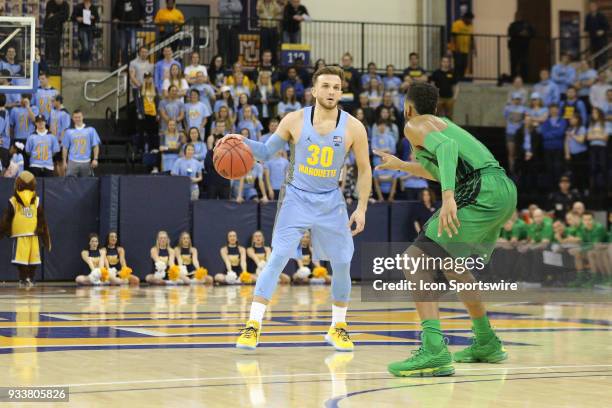 Marquette Golden Eagles guard Andrew Rowsey waits for a play to develop during a National Invitation Tournament game between the Marquette Golden...