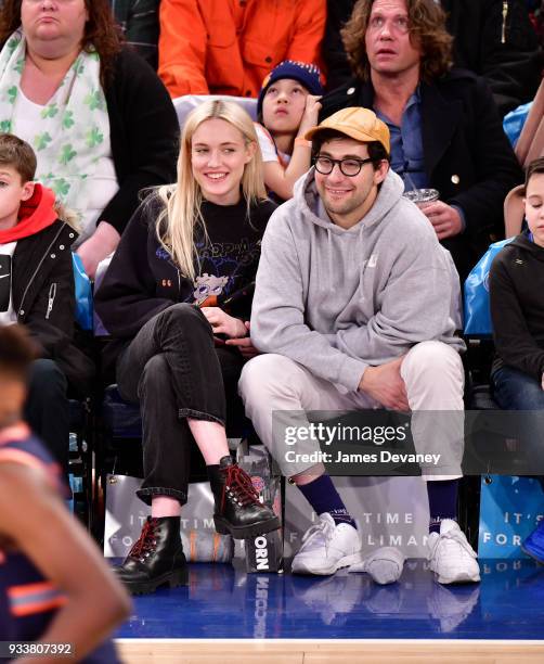 Carlotta Kohl and Jack Antonoff attend New York Knicks Vs Charlotte Hornets game at Madison Square Garden on March 17, 2018 in New York City.