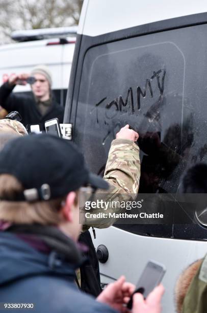 Tommy Robinson's supporters surround his bus as he leaves Speakers Corner on March 18, 2018 in London, England. PHOTOGRAPH BY Matthew Chattle /...